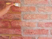 Como pintar parede de tijolos a vista